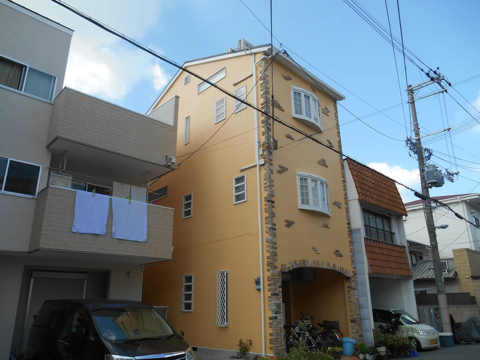 大阪市西淀川区 S様邸の屋根張替・外壁塗装・施工後の写真